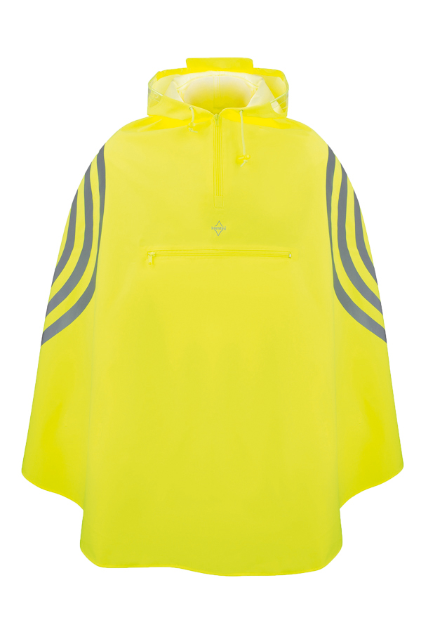 Woman wearing a yellow hooded rain poncho while standing next to a bicycle on a cycle path