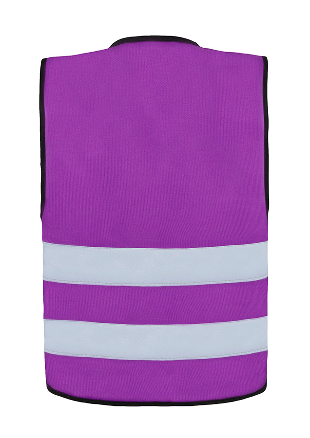 Young smiling girl in signal yellow Korntex safety vest with reflective stripes and zip fastener standing in the park