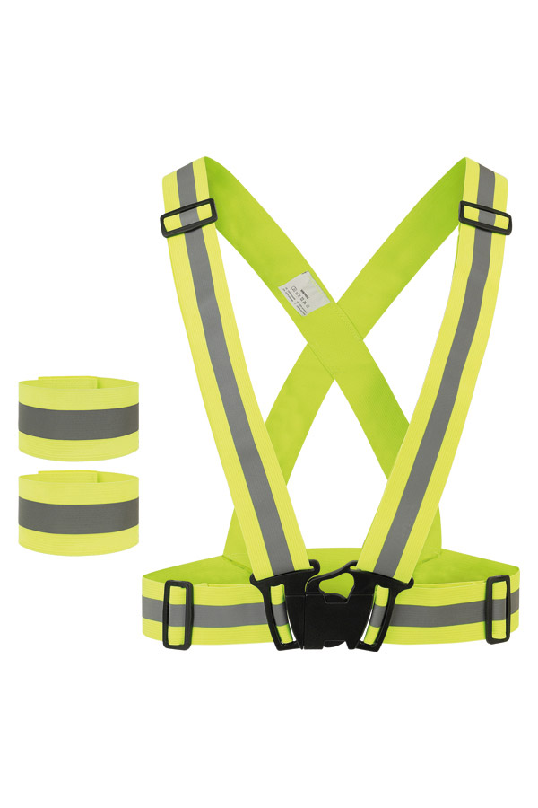 Adult woman wears Korntex safety vest bands on her body and upper arms