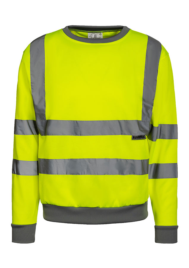 Adult man wearing a signal yellow Korntex Hi-Vis sweatshirt and white helmet on a construction site
