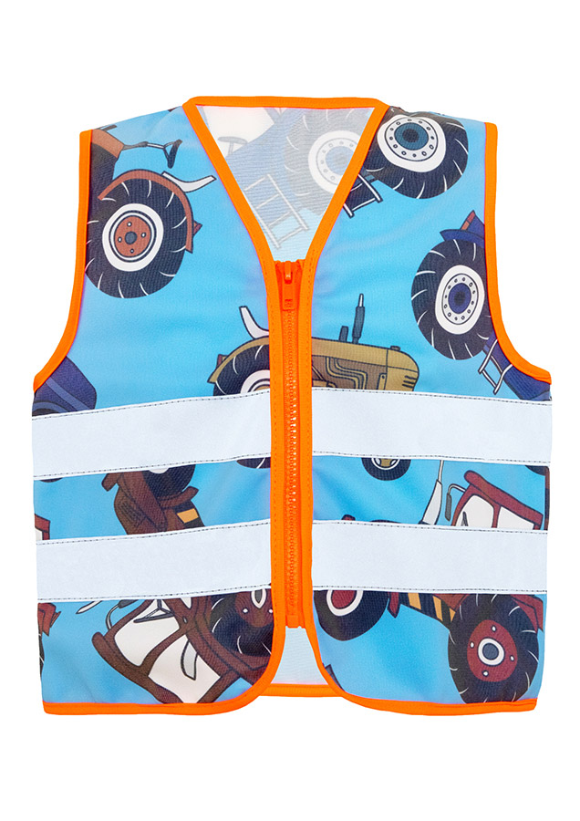 Child in a blue Korntex safety vest with tractor pattern on a playground