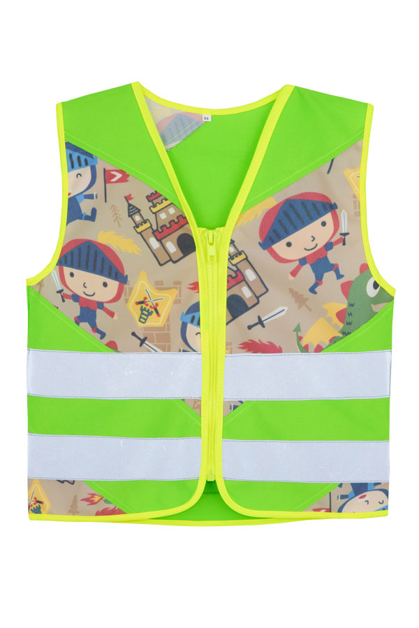 Child in a neon green Korntex safety vest with knight pattern in a park