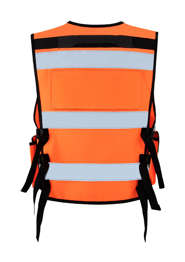 Adult in orange Korntex tactical safety vest with zip on a construction site