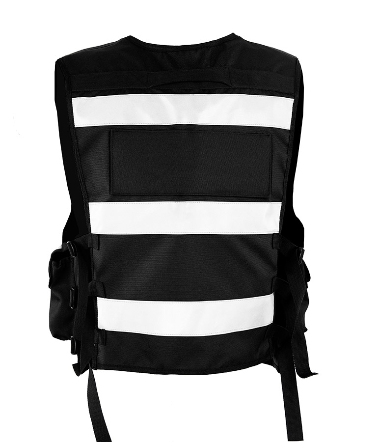 Adult in orange Korntex tactical safety vest with zip on a construction site