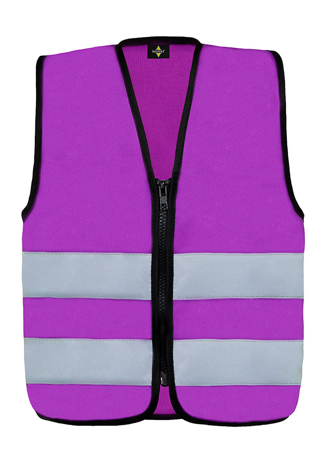 Young smiling girl in signal yellow Korntex safety vest with reflective stripes and zip fastener standing in the park