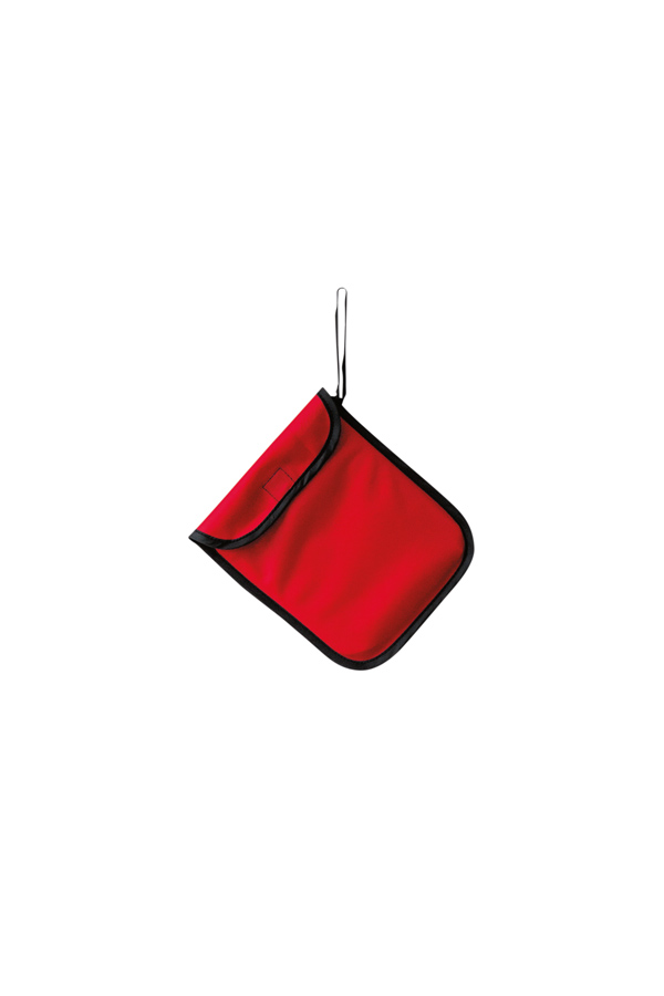 Adult person holding a signal yellow Korntex storage bag