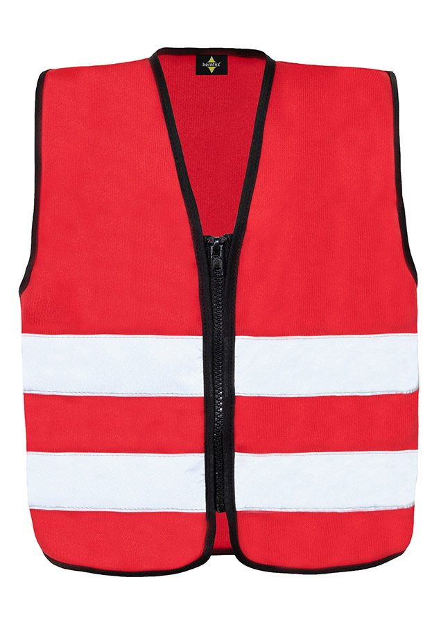Young smiling girl in signal yellow Korntex safety vest with reflective stripes and zip fastener standing in the park