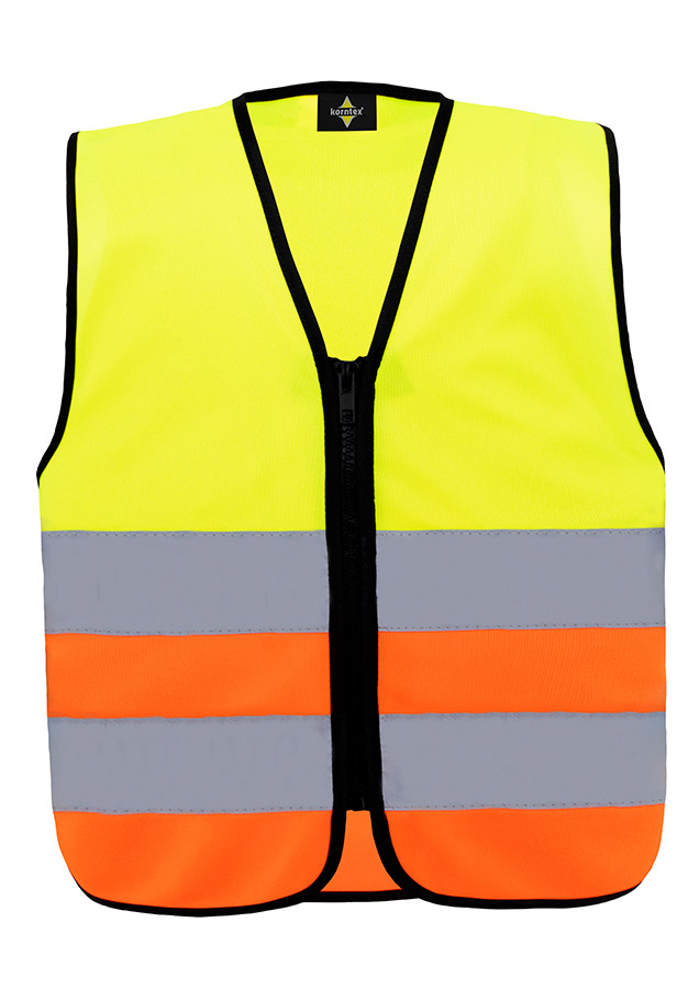 Young smiling girl in signal yellow Korntex safety vest with reflective stripes and zip fastener standing in the park