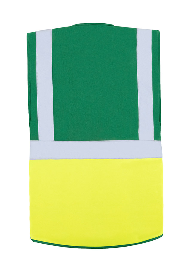 A woman wears a pink Korntex safety vest with reflective stripes in a warehouse