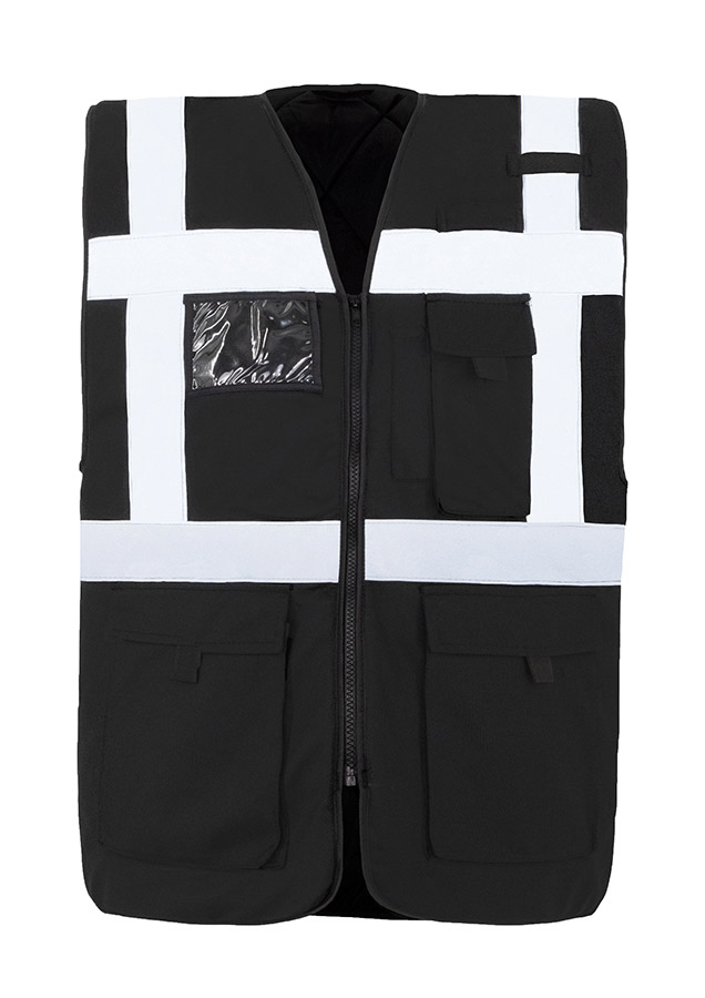 Adult in signal yellow, lined Korntex safety vest with zip fastener in an industrial environment