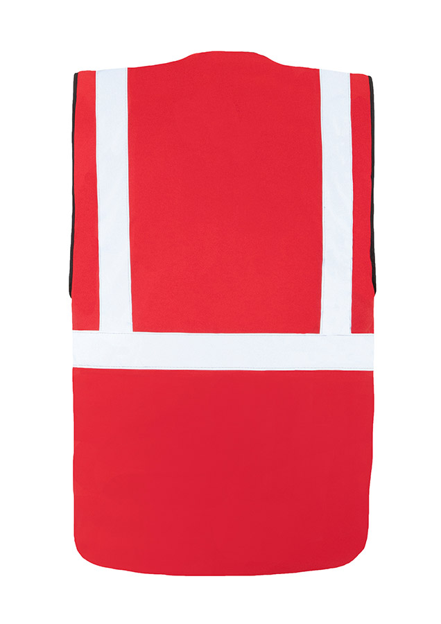 Adult in signal yellow, lined Korntex safety vest with zip fastener in an industrial environment
