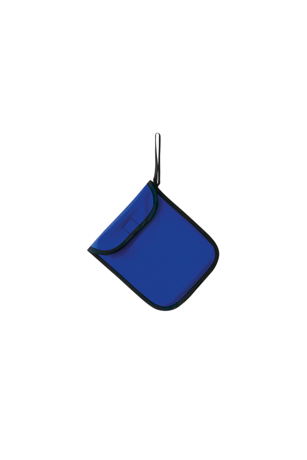 Adult person holding a signal yellow Korntex storage bag