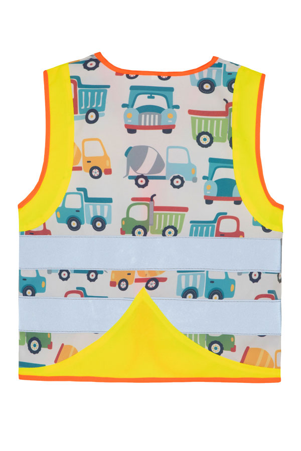 Child in a yellow Korntex safety vest with a construction vehicle pattern on a playground