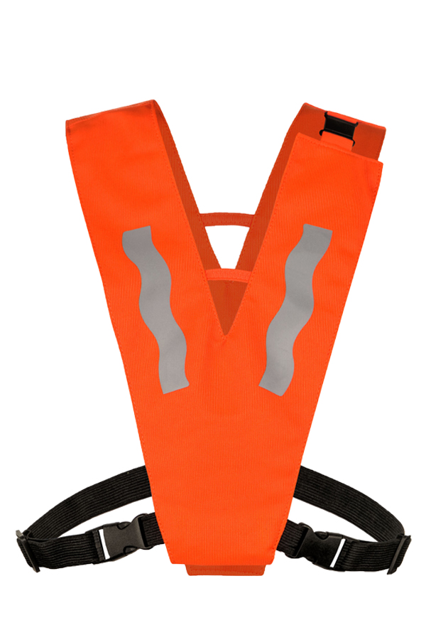 A child wearing an orange Korntex multifunctional collar with reflective stripes is standing in a park.