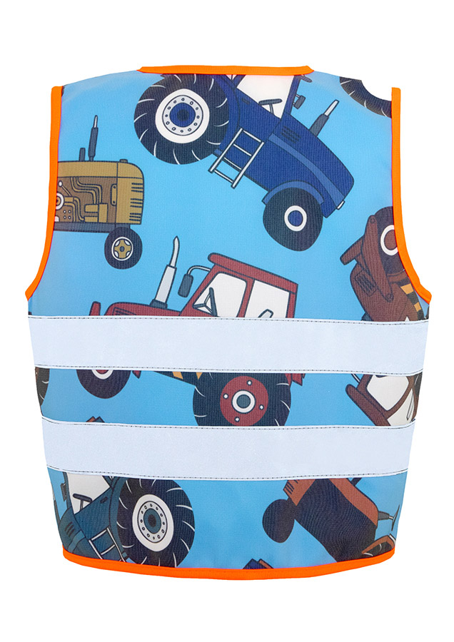 Child in a blue Korntex safety vest with tractor pattern on a playground